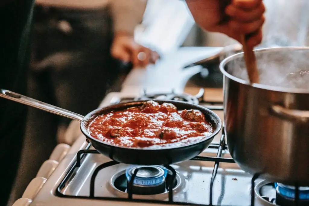 Meatballs cooking in Sauce