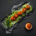 Flavorful Meatballs on a bed of lettuce