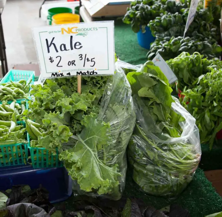 Cooking with Kale - Market stall with Kale on sale, ready to be enjoyed.