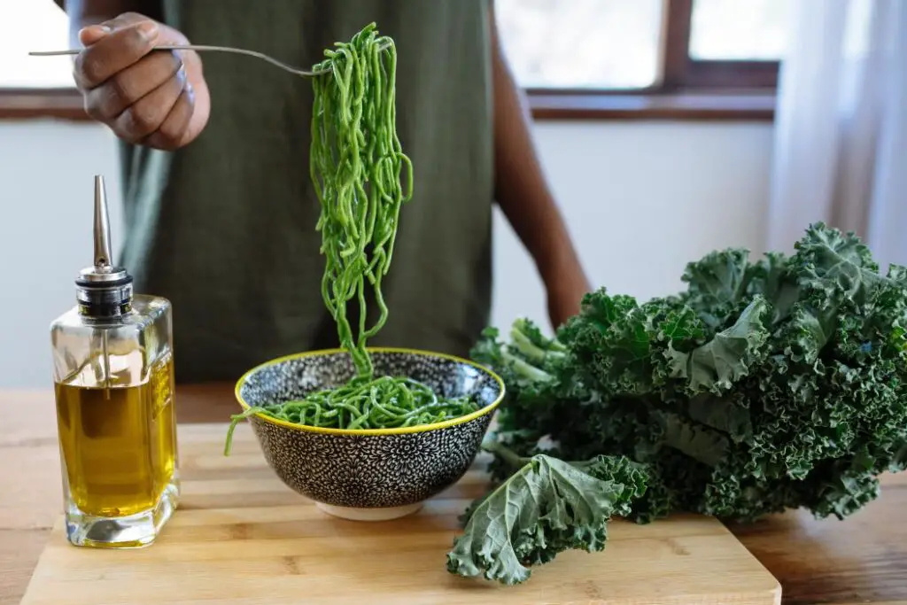 Cooking with Kale - green spaghetti being served