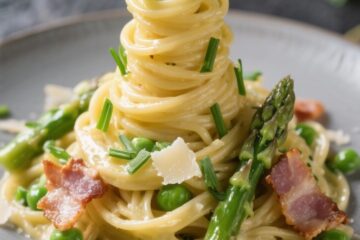 Final dish presentation: Restaurant-quality plate of Spring Vegetable Carbonara with a single, tall