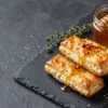Viral Bites: Making Chili Honey Magic for Feta Rolls