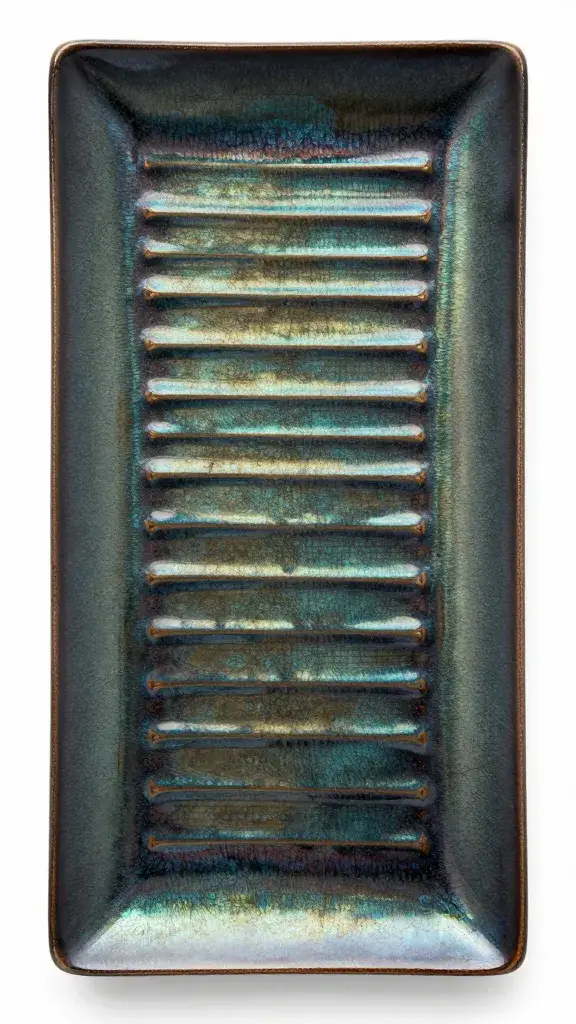 single rib slab with jewel-toned glaze on dark plate