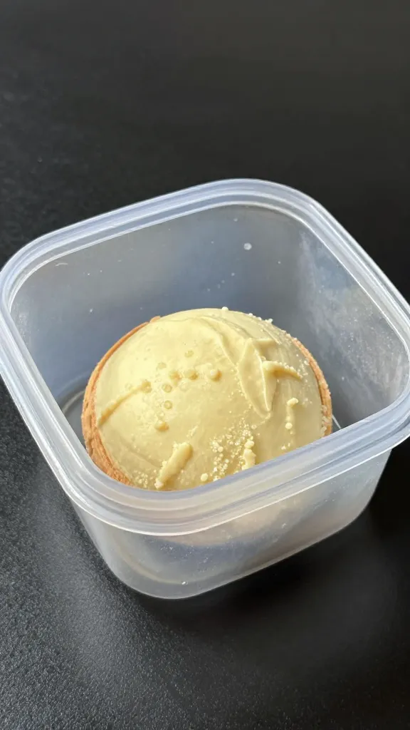 chilled airtight container holding single pastry bite