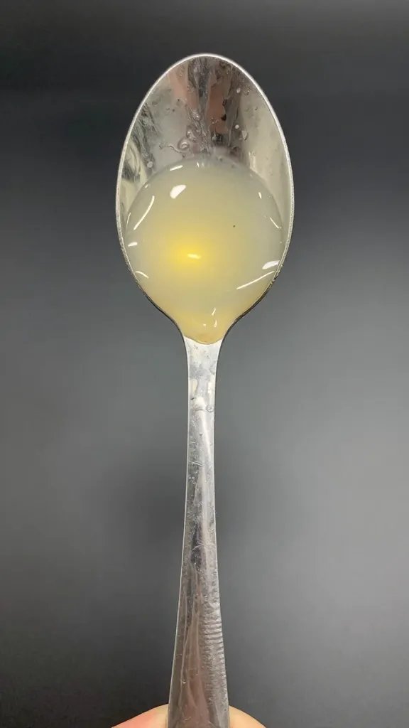 metal spoon test showing glaze clinging, not runny
