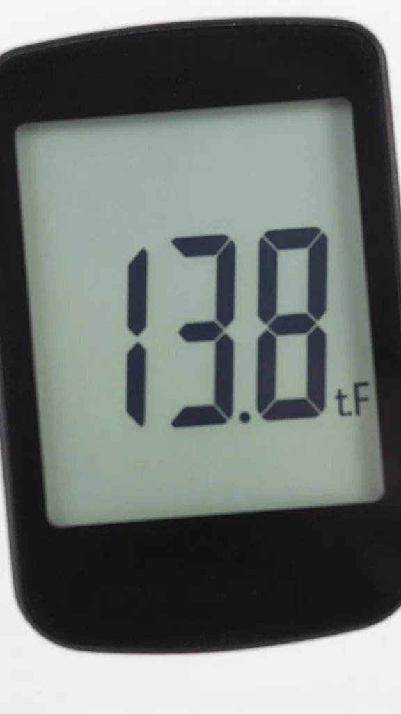 digital instant‑read thermometer reading 135°F, closeup