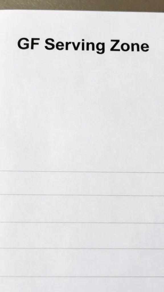 Closeup of a digital prep list labeled “GF Serving Zone”