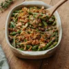 Spoon lifting portion of green bean casserole