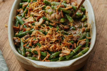 Spoon lifting portion of green bean casserole