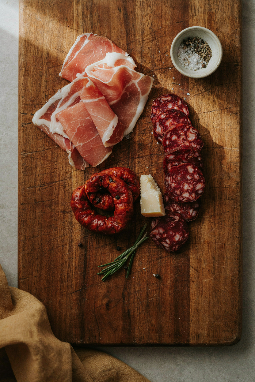 Cured meats fanned on cutting board