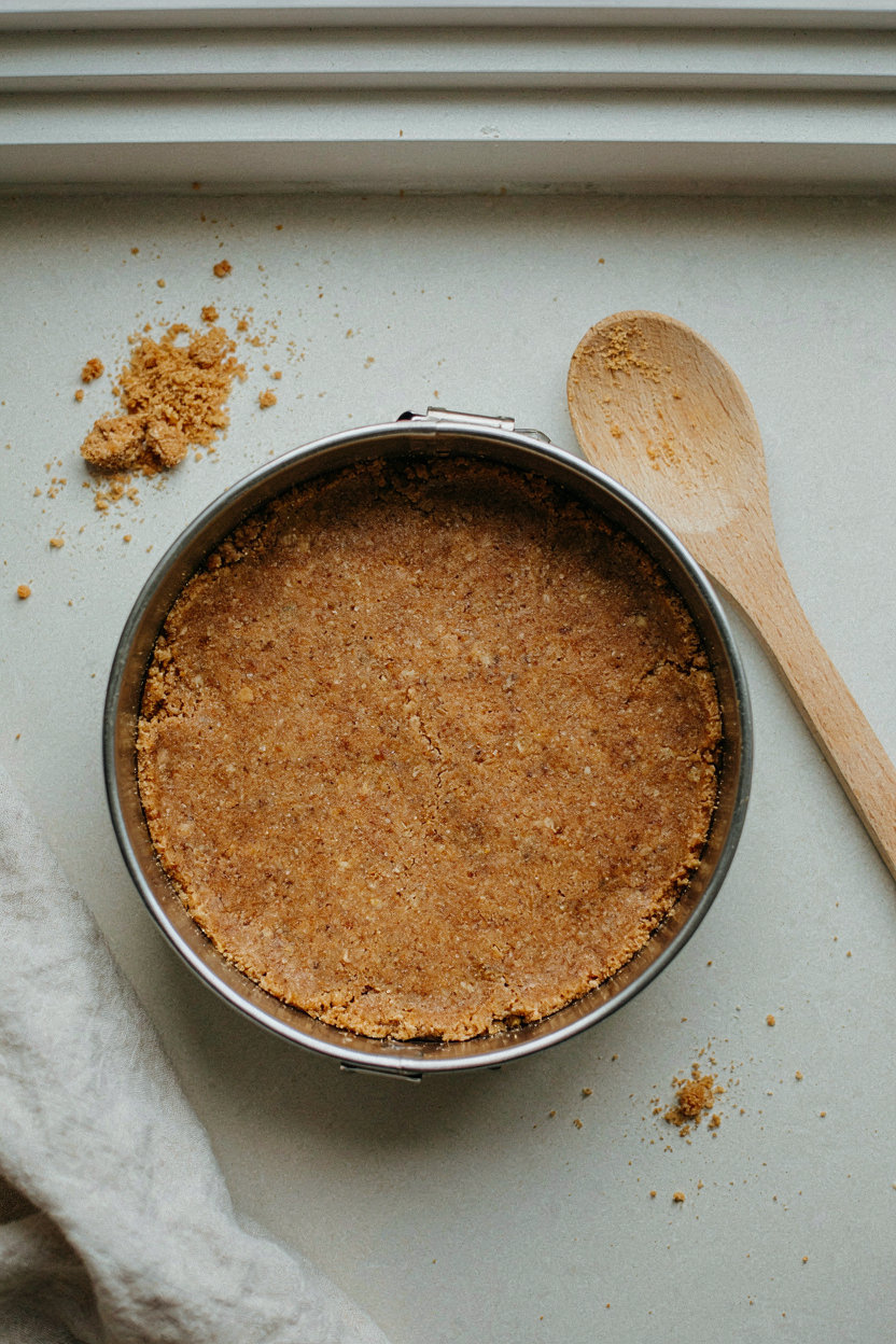 Graham cracker crust pressed in springform