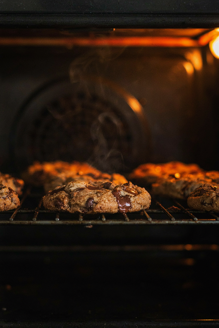 Cookies baking with golden edges