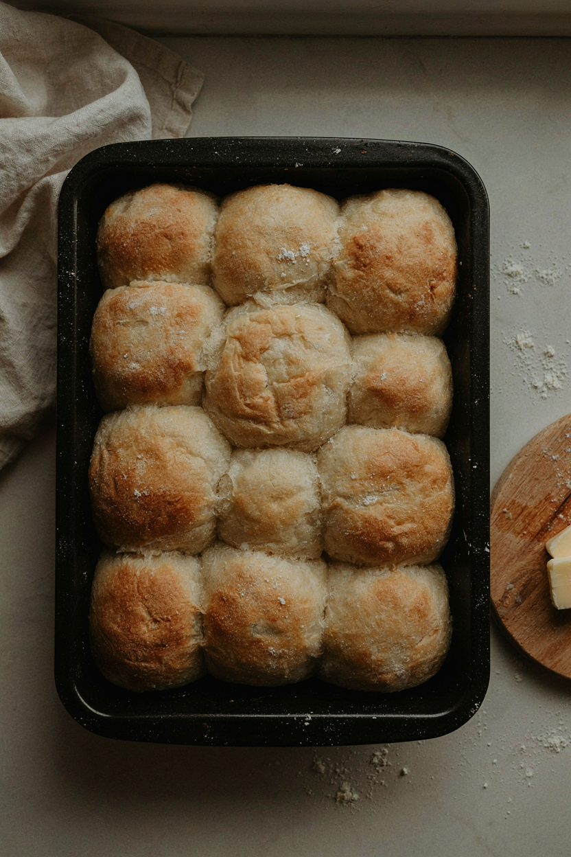 Rolls rising in pan until puffy