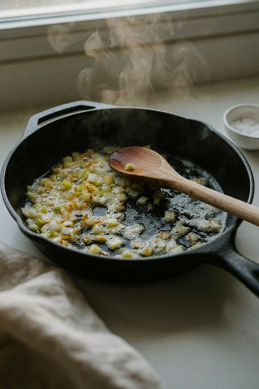 Onion and celery softening in browning butter