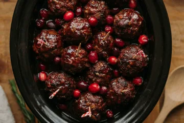 Slow cooker of glossy glazed turkey meatballs
